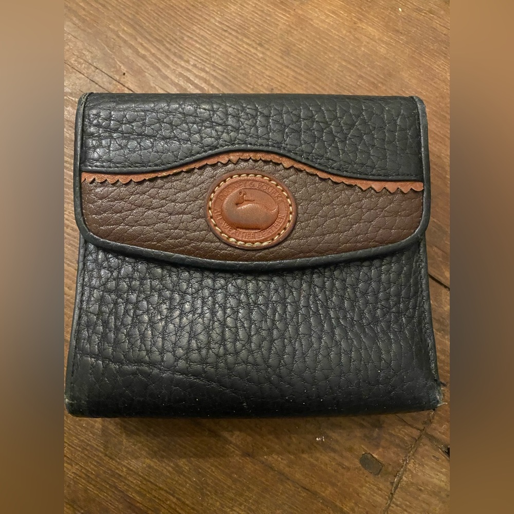 Dooney and Bourke Vintage Black pebbled leather card wallet.